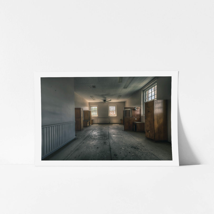The Upstairs Corner at The Asylum, timber wardrobes line the walls of a broad, empty room.