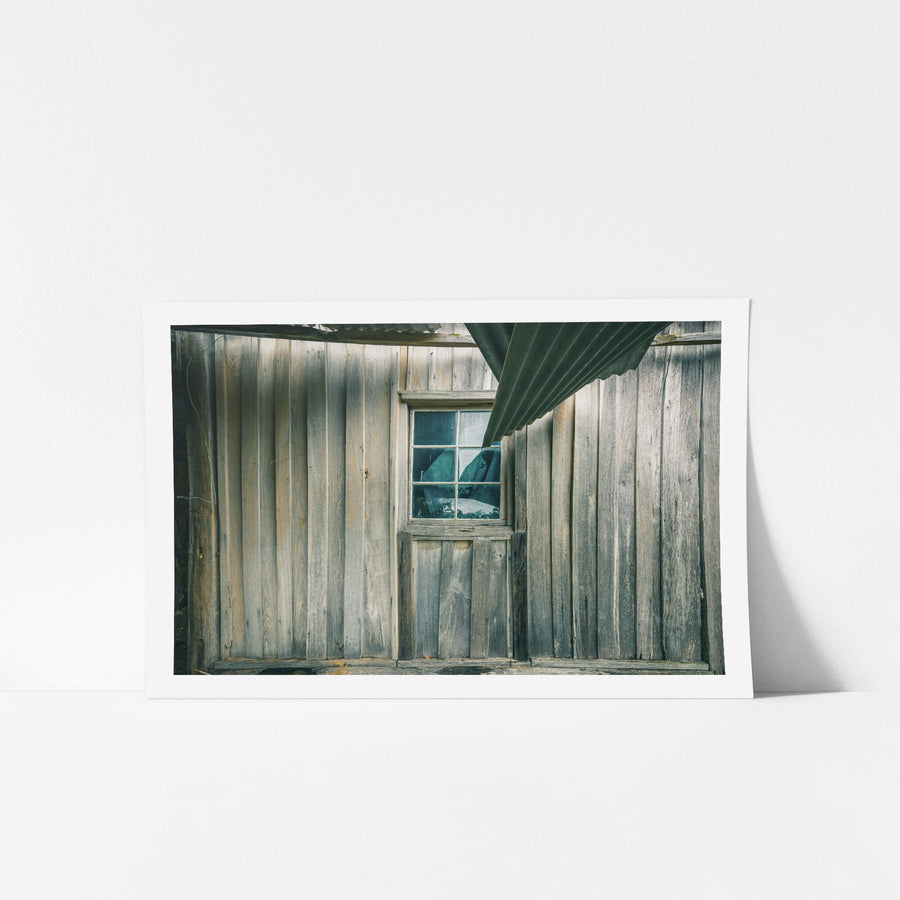 Verandah Wall at The Post Office, weathered timber boards line the corner where two walls meet at the verandah.