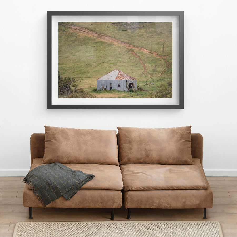 Bottom Of The Hill at The Woolshed, a fibro and corrugated iron shed sits low in a shallow gully, dwarfed by the green.