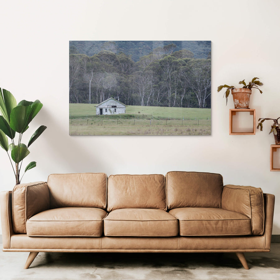Nimmitabel Shed at The Woolshed, a single weatherboard shed sits on a low rise in the middle of open grazing country near.