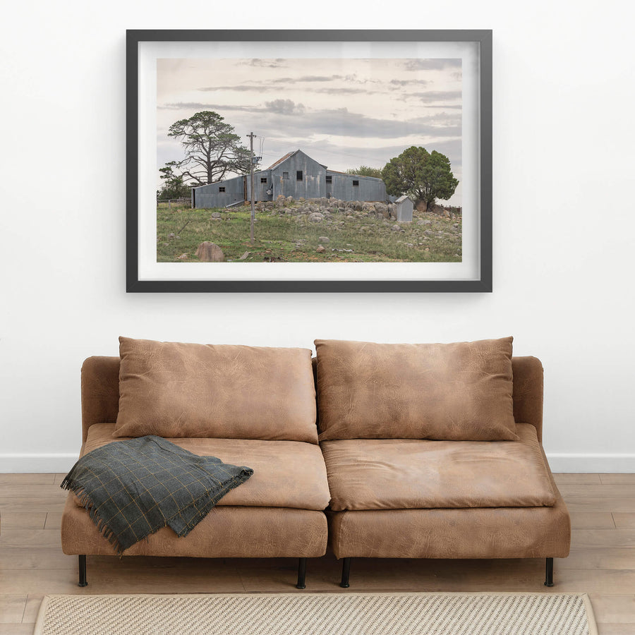 Numbla Vale Woolshed at The Woolshed, a corrugated iron woolshed perched atop a rocky crest.