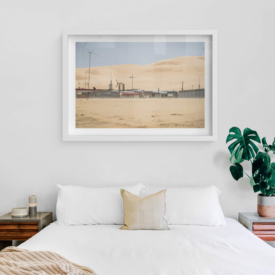 Aerials at Tin City, a low line of corrugated iron shacks sits half-buried at the base of the Stockton Dunes.