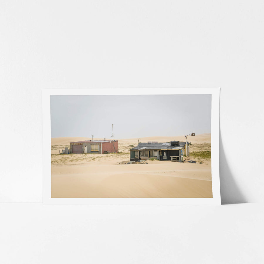 Filthy Phill And Seven at Tin City, two shacks sit low against the Stockton Bight dunes.