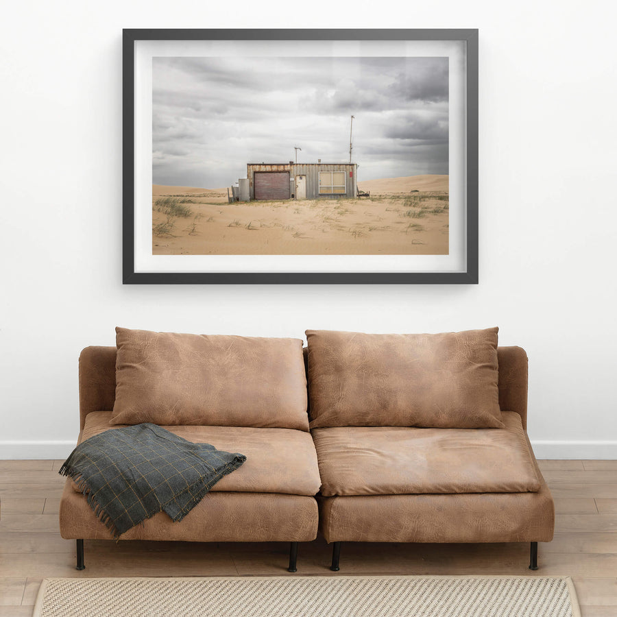 Seven at Tin City, shack number seven sits low against the dunes at Tin City, Stockton Beach.