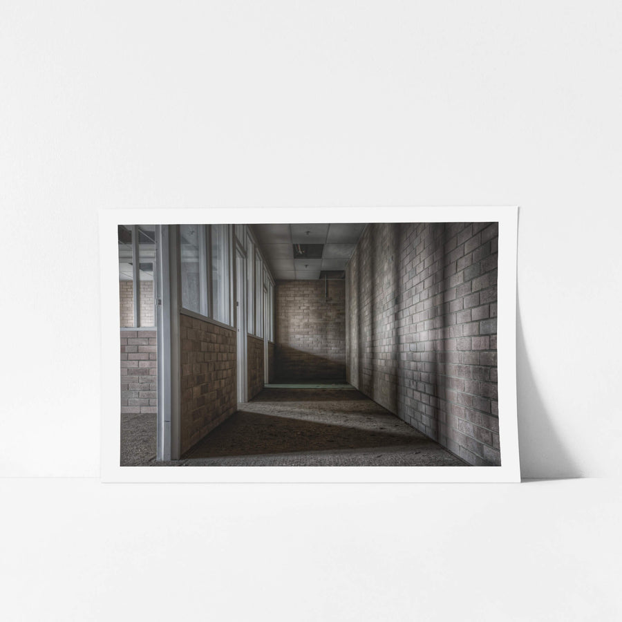 Engineers Office at Wangi Power Station, a narrow corridor of brown brick narrows toward a dead end.