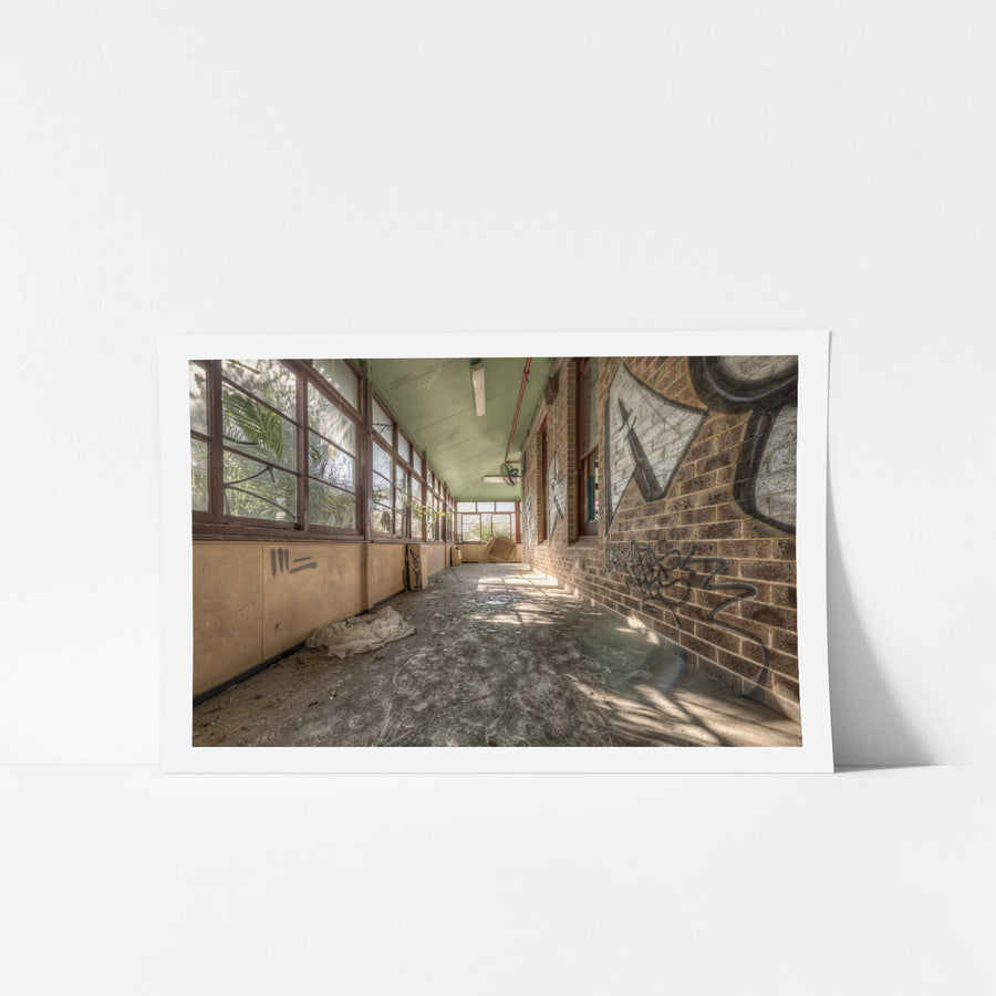 Brick Annex at Waterfall Sanatorium, a covered verandah runs along the brick annex, its pale green timber ceiling still.