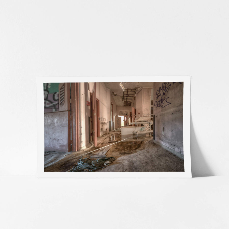 Caleb Was Here at Waterfall Sanatorium, a corridor runs deep into the ward.