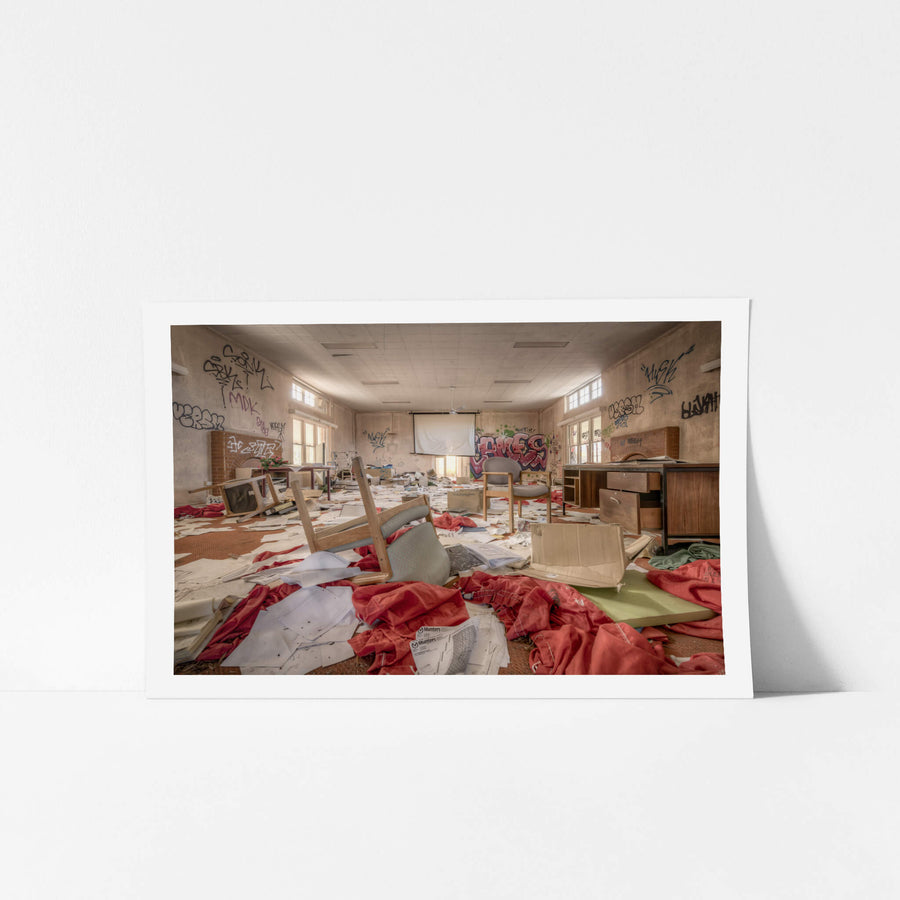 The Document Room at Waterfall Sanatorium, patient documents, strewn across a heavily graffitied room with upturned.