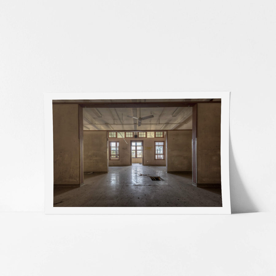 Squares In Squares at Waterfall Sanatorium, timber posts frame a sequence of open rooms, each threshold leading deeper.