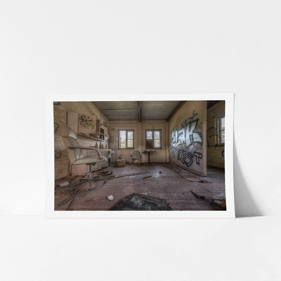 The Shed at Waterfall Sanatorium, a cream brick room with a corrugated iron ceiling.