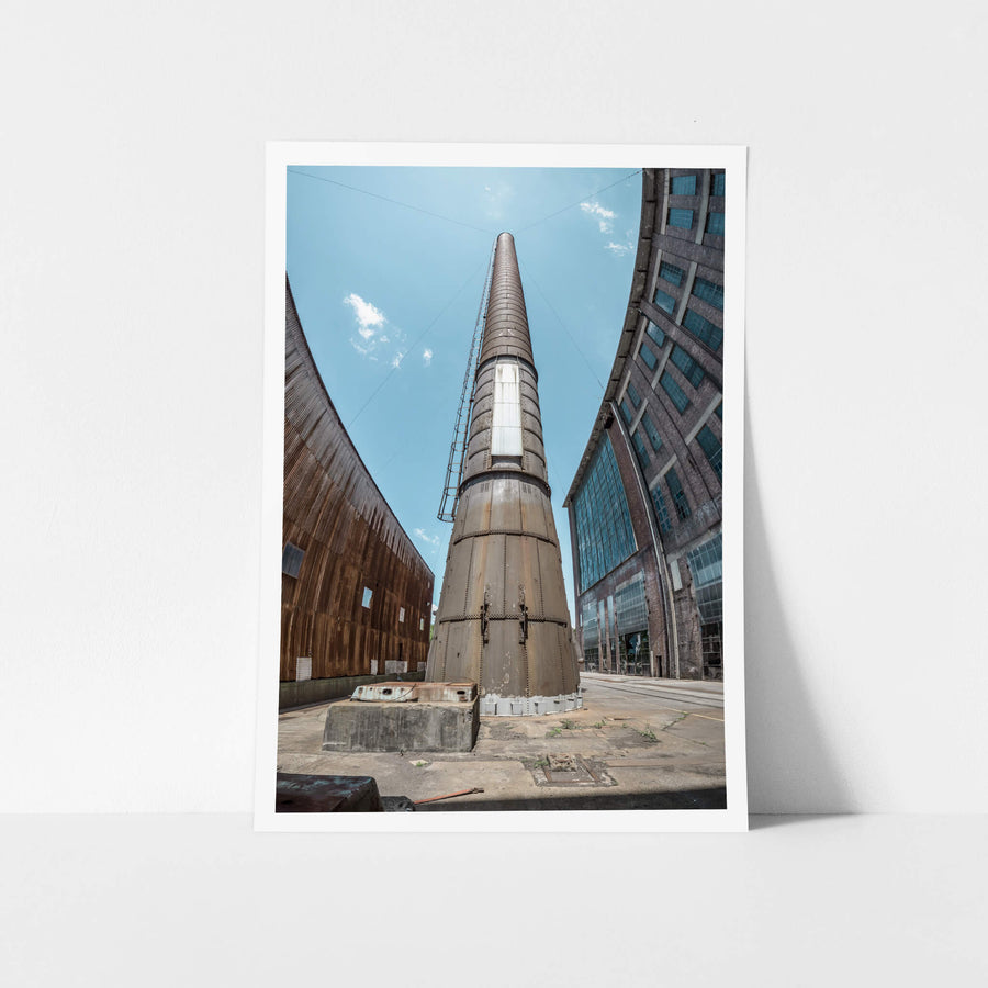Chimney at White Bay Power Station, riveted steel panels rise skyward, forming the towering chimney of White Bay Power.