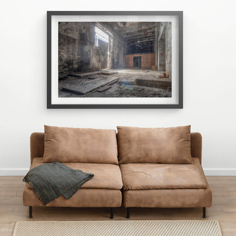 Rail Corridor Exit at White Bay Power Station, light enters through a high industrial opening on the left wall, falling.