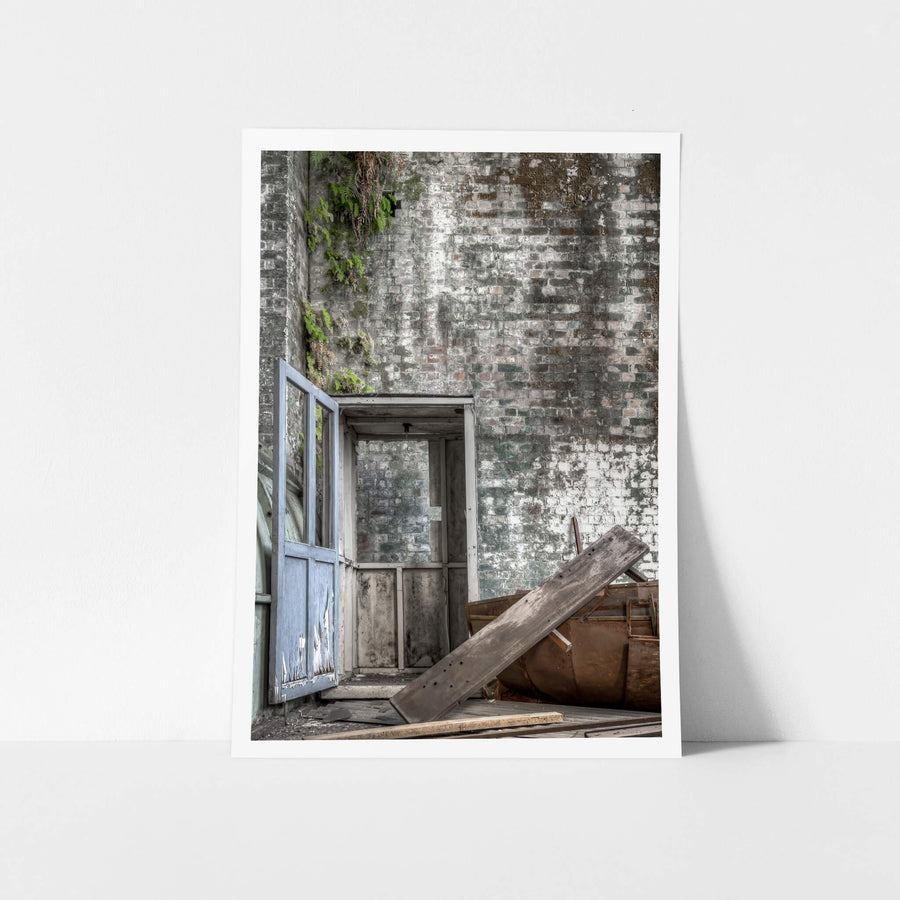 Turbine Hall Refuse at White Bay Power Station, a weathered timber man box stands open at White Bay Power Station.