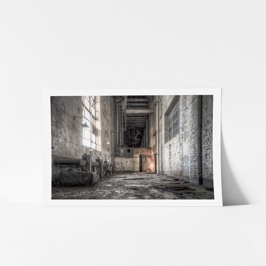 Workshop Facing South at White Bay Power Station, a narrow corridor between brick walls rises two storeys high.