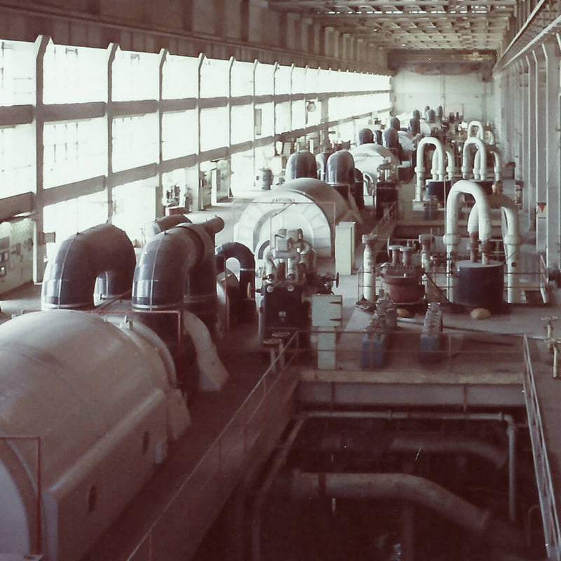 Wangi Power Station turbine hall during operations, turbine sets running the length of the floor.