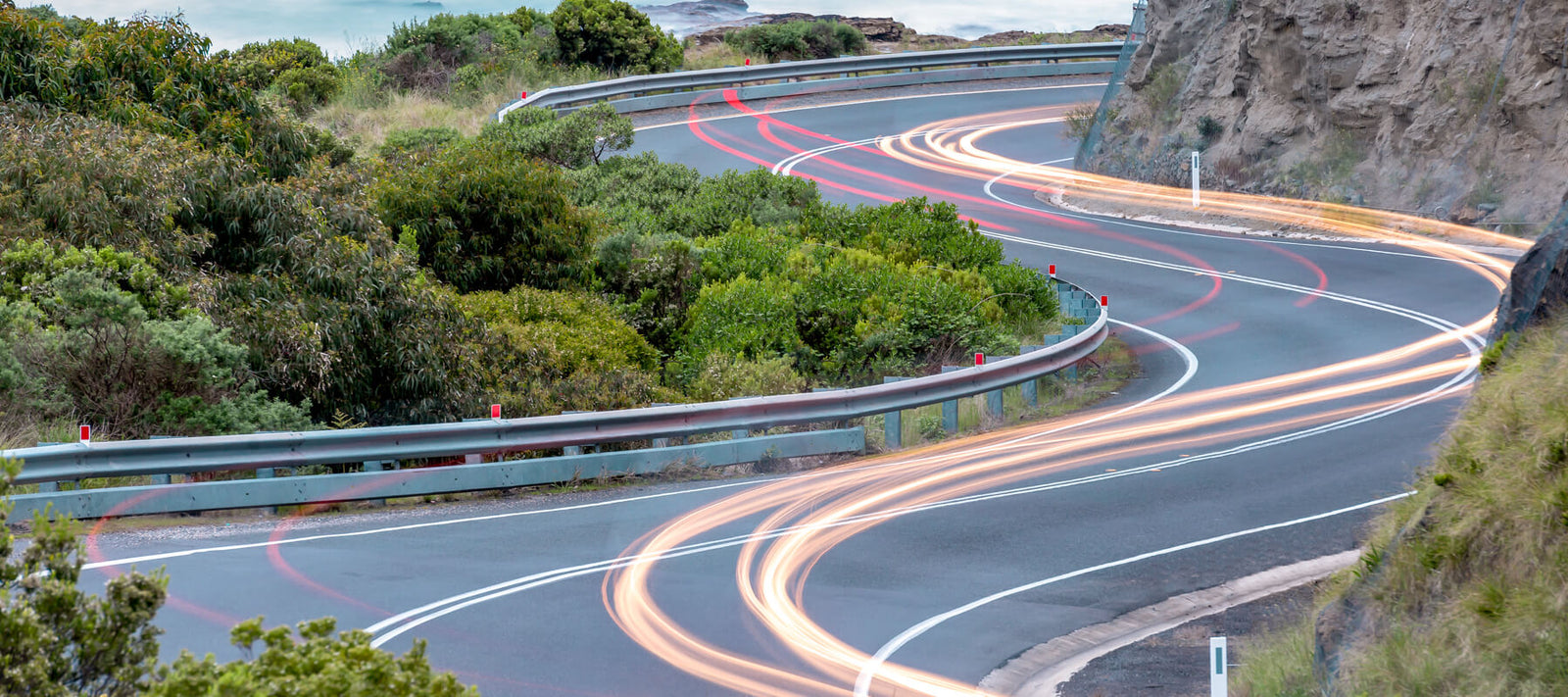 Industrial refinery with smoking chimneys set against the Sydney skyline, captured in atmospheric tones. Part of the Lost Collective Landscapes Prints Collection.