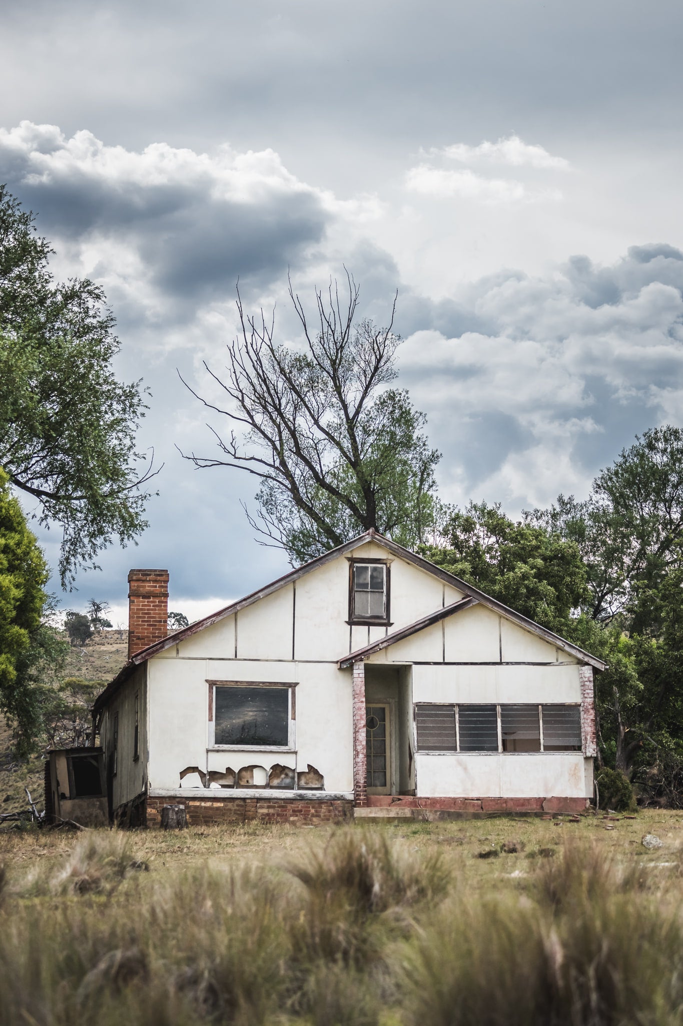 Brooding Skies at A Place to Call Home, a simple, abandoned fibro farmhouse near Nimmitabel, shot with an afternoon summer.