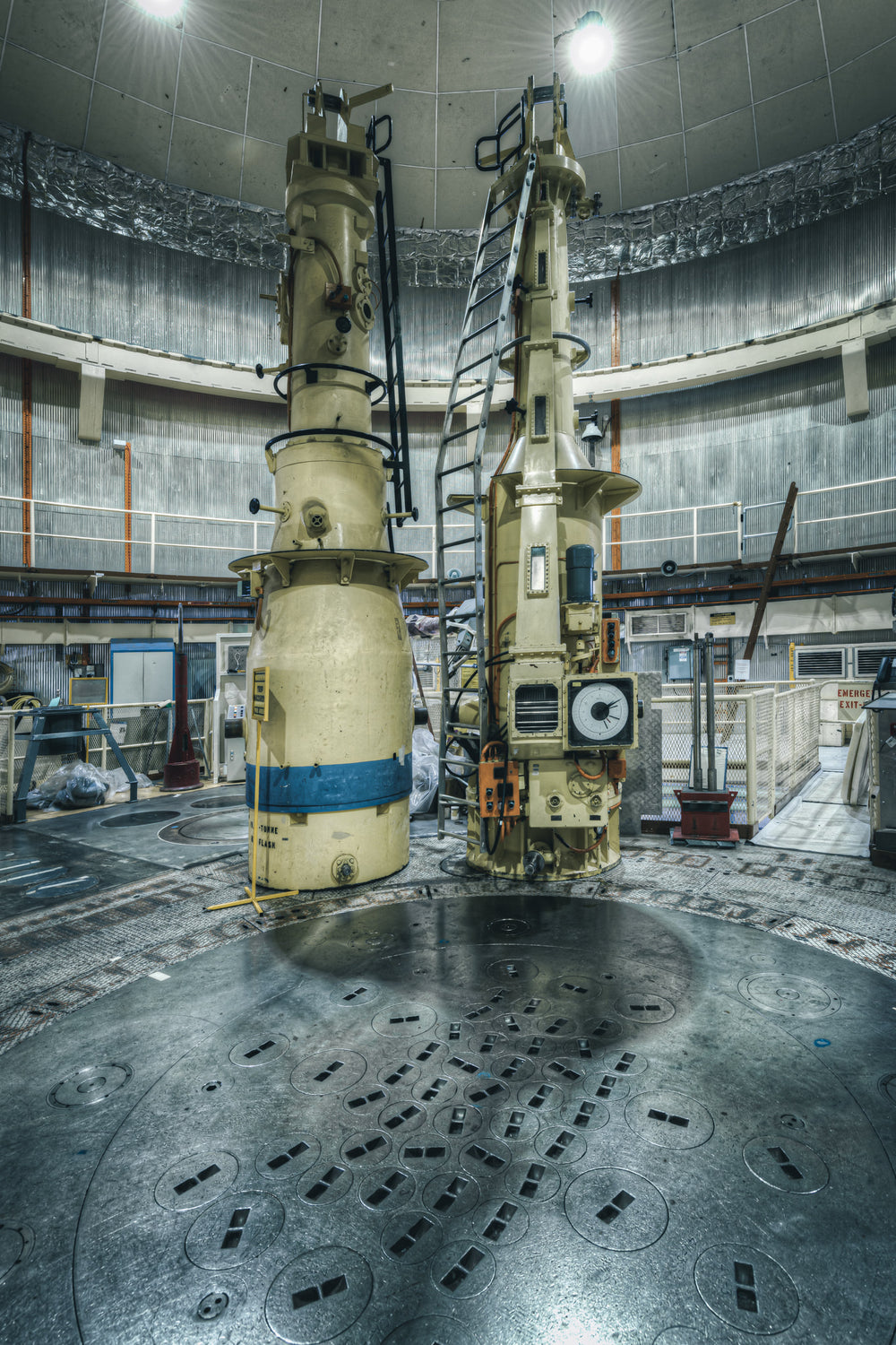 Irradiation Rig Handling Flasks at ANSTO HIFAR, this image from ANSTO’s HIFAR reactor highlights the specialized rig flasks.