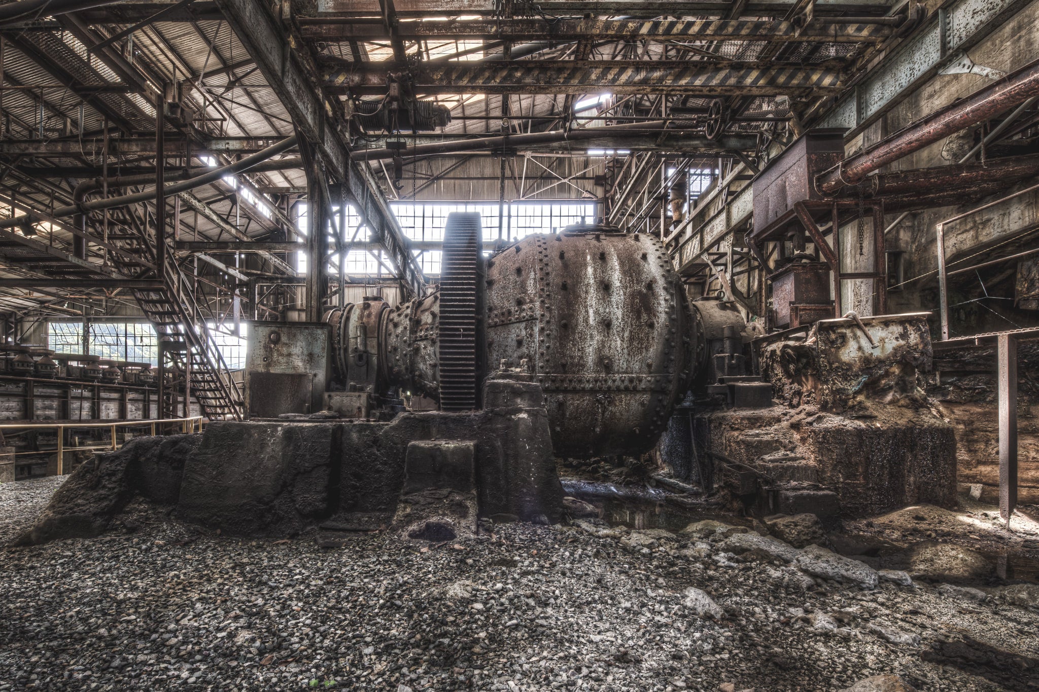 Ball Mill at Ashio Copper Mine, a massive ball mill sits on concrete footings inside the ore processing hall.