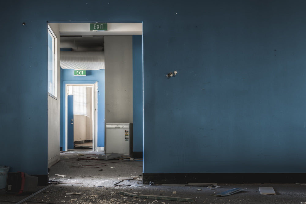 Downstairs Office at ATL Building, deep blue walls dominate the room.