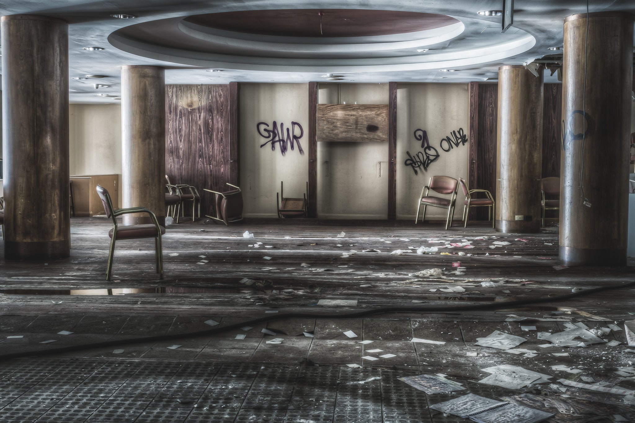 Restaurant at Balmain Leagues Club, years of rain water leaking onto the floorboards have caused them to warp and undulate.
