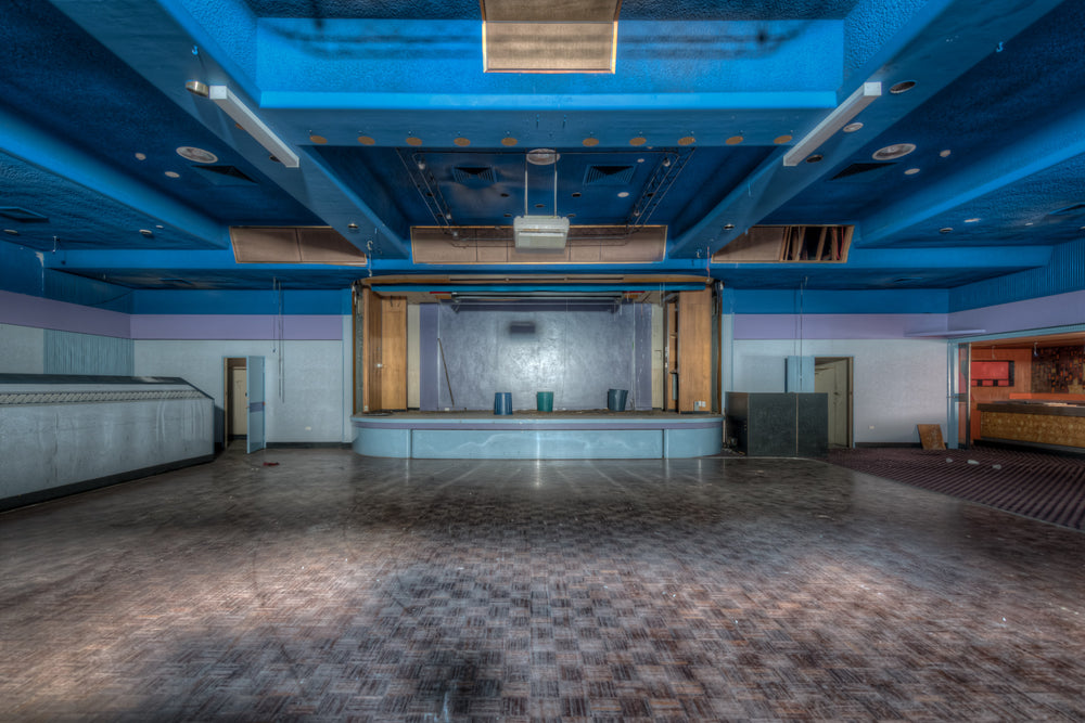Nightclub at Bankstown RSL, a wide ballroom opens onto a raised stage at centre frame.