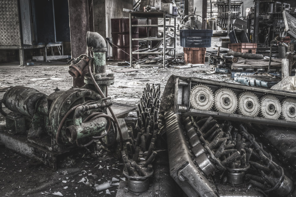 Rendering Plant Machinery at Blayney Abattoir, disassembled equipment from the former rendering plant lies scattered.