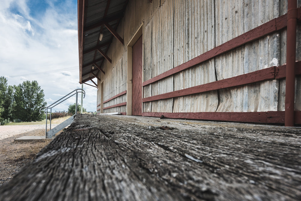 Goods Shed Timber Platform at Bombala Station, weathered hardwood planking runs the length of the loading platform.