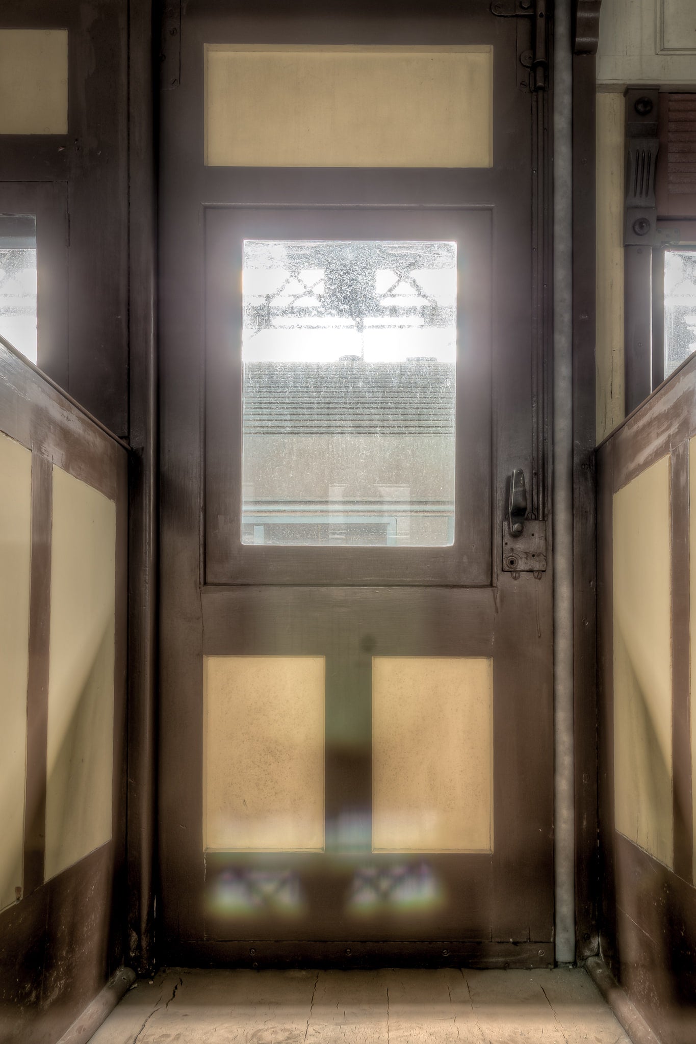 Side Door at Eveleigh Paint Shop, the Centurion, carriage 4279, underwent significant modifications during its long service life.