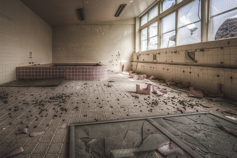 Girls Yokosou at Family School Fureai, the bathing stools are broken and strewn across the room amongst broken glass.