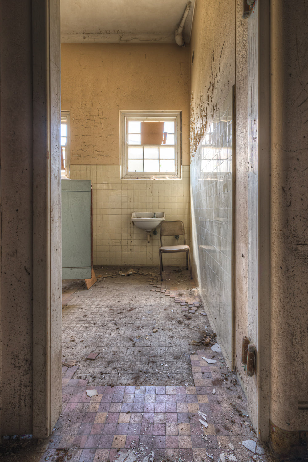 Basin at Female Ward 9 & 10, a doorway opens onto a small utility room.
