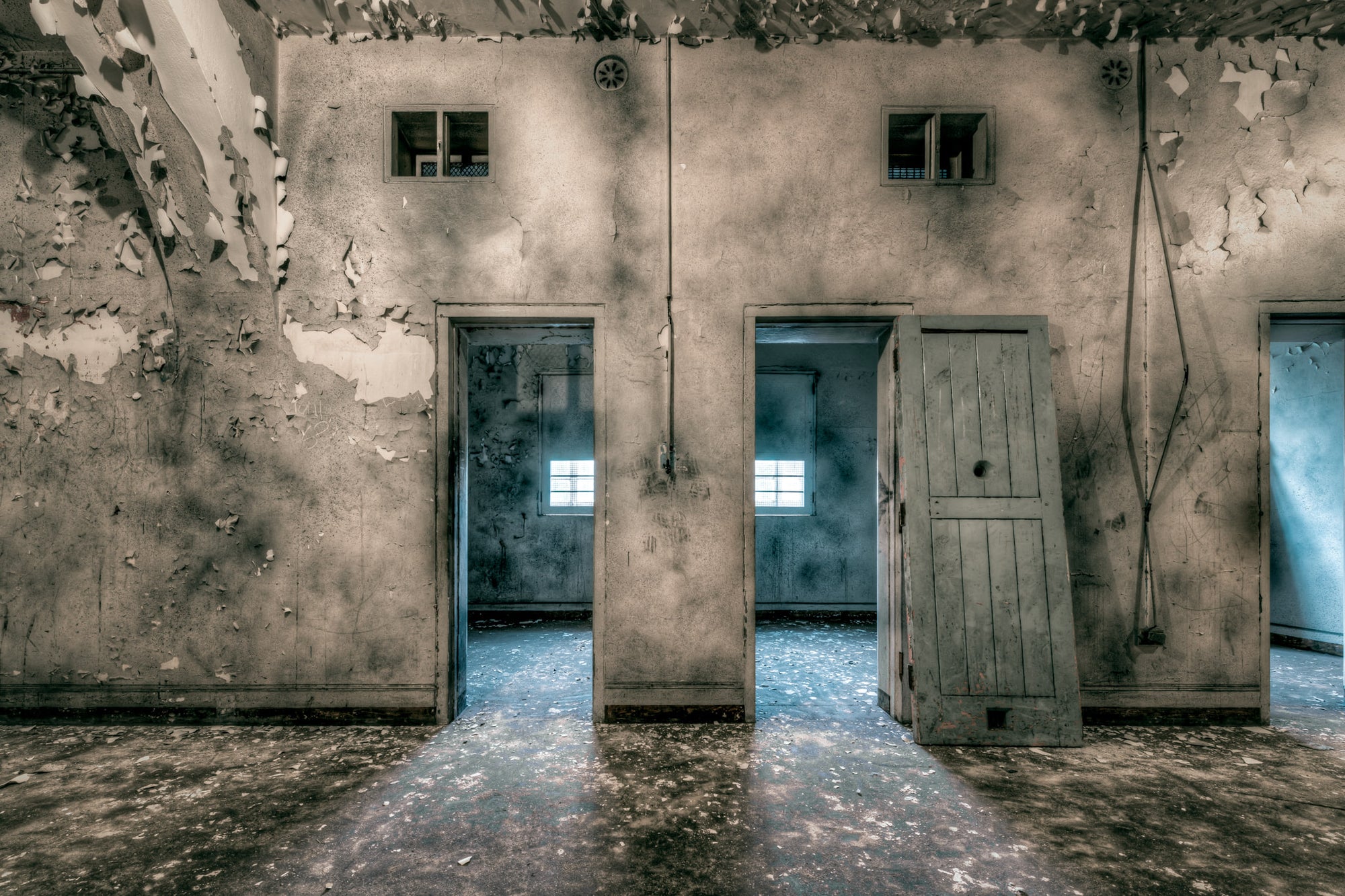 Cell Doors at Female Ward 9 & 10, open doors showing inside the tiny patient rooms of the Female Ward 9 and 10 of Callan.