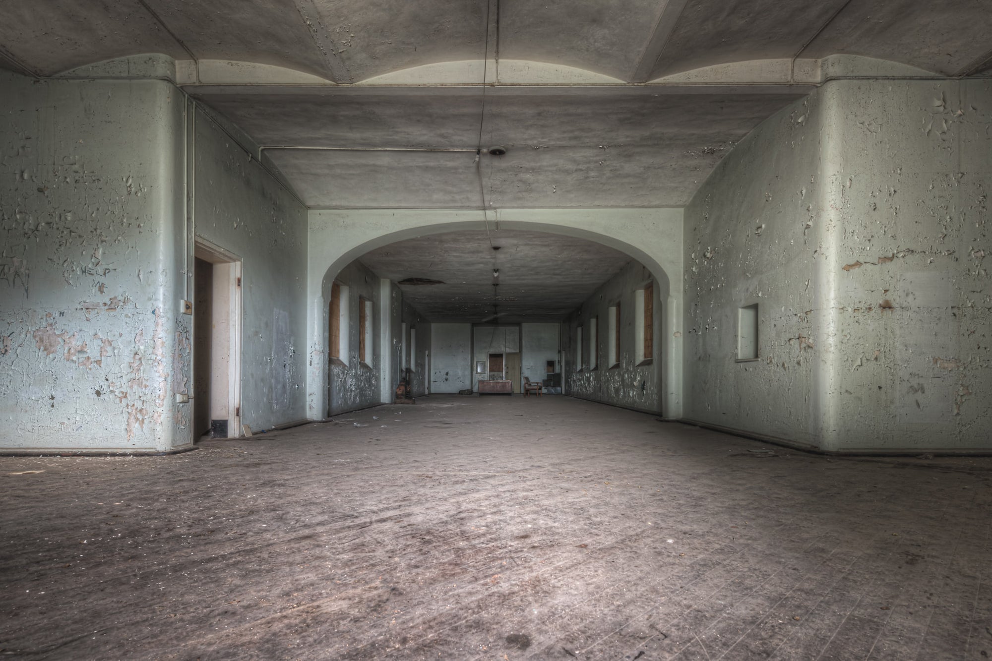 Kirkbride Ward at Female Ward 9 & 10, a dark and empty room within the female ward.