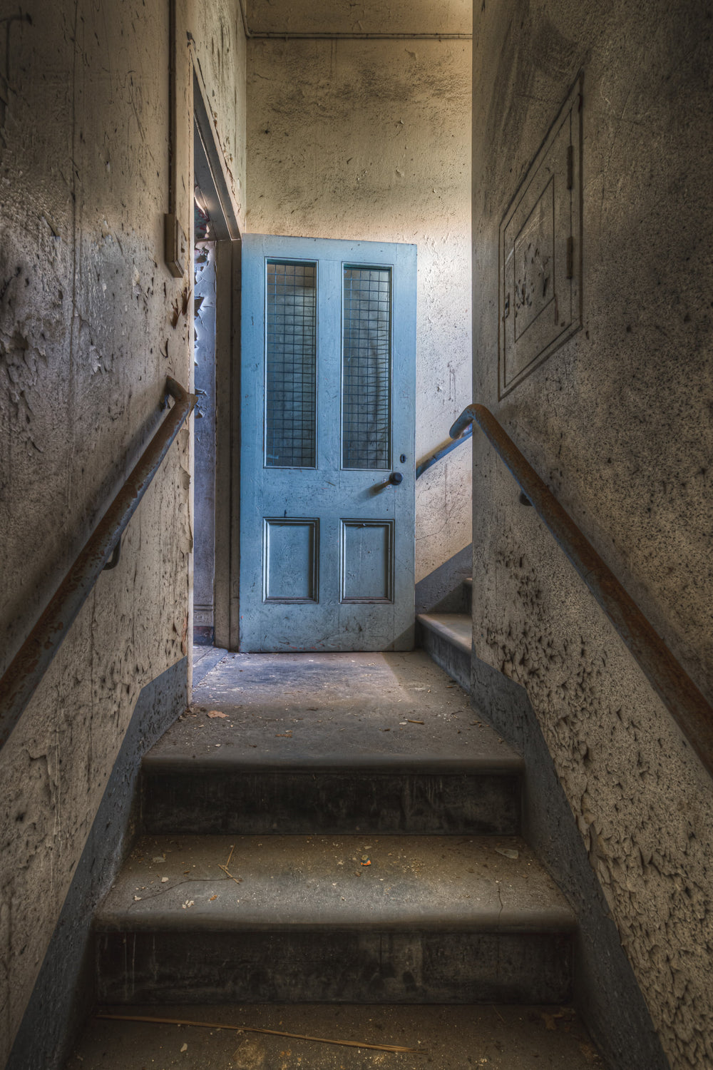 Stairwell at Female Ward 9 & 10, stairs leading between the upper and lower levels of the Female Ward.