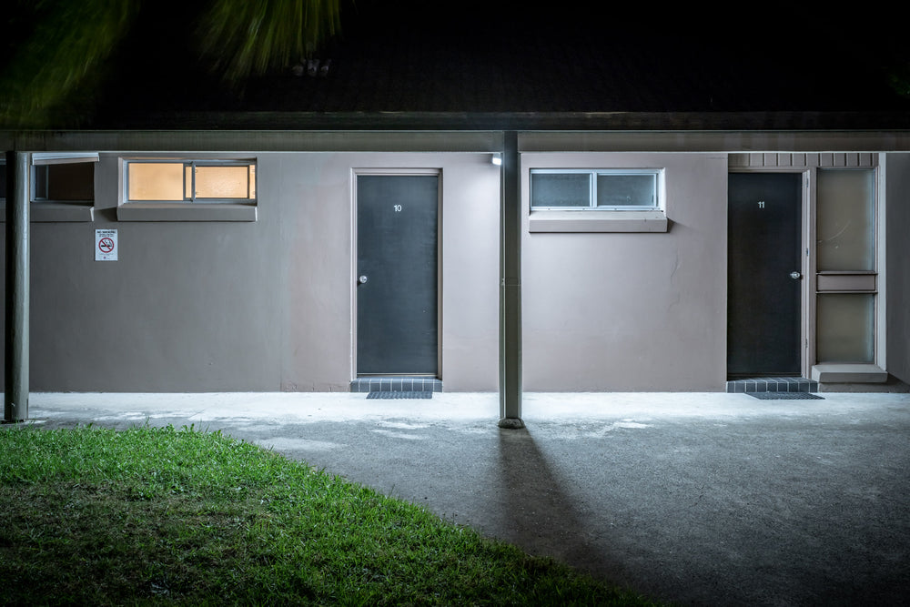 Comfort Inn Towradgi Beach at Hotel Motel 101, two doors sit side by side in a single-storey concrete block building.