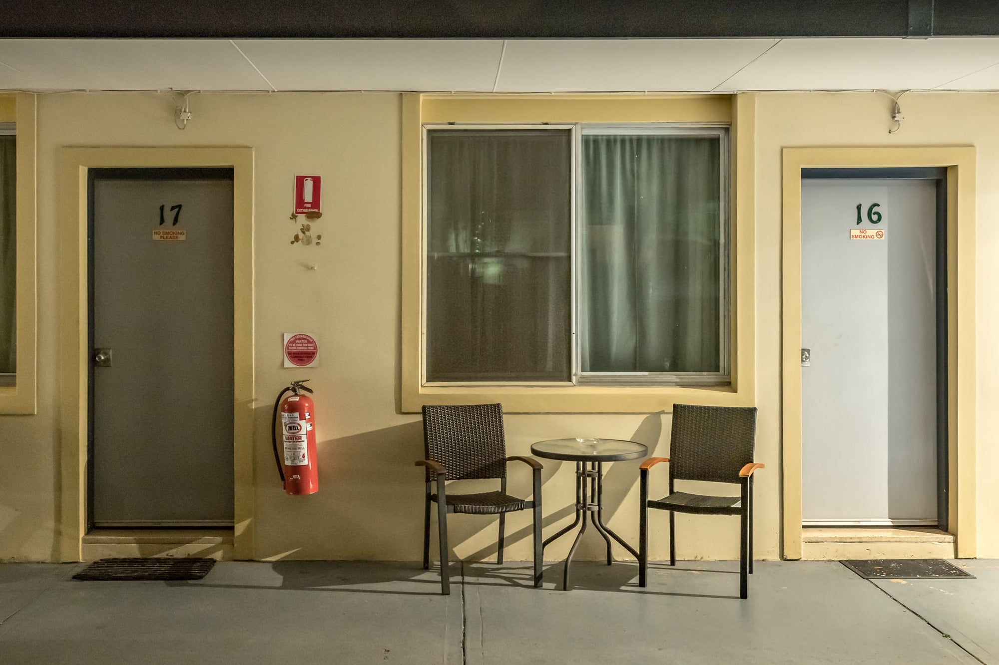 High Mountains Motor Inn at Hotel Motel 101, rooms 16 and 17 sit side by side beneath a concrete awning.