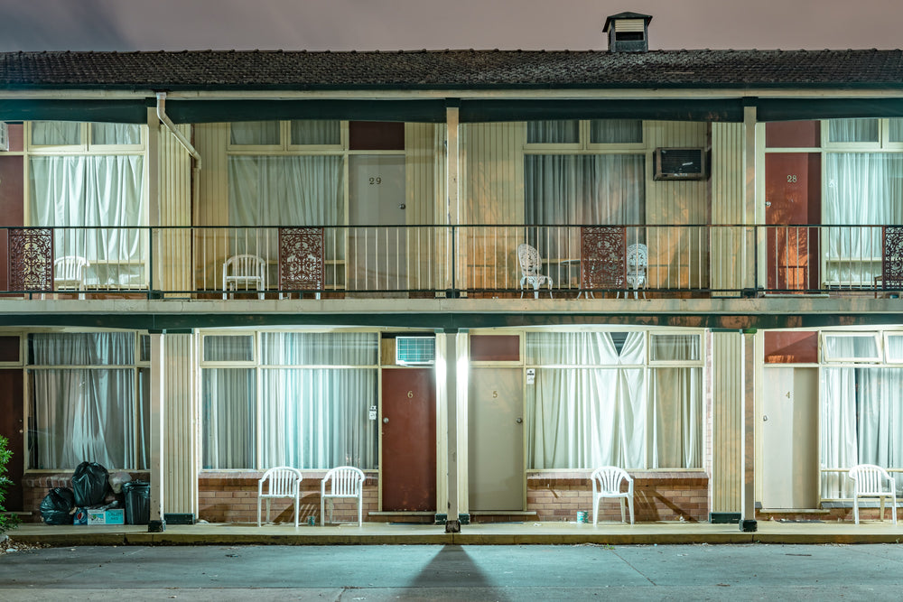 The Fontainebleau Motor Inn, Liverpool at Hotel Motel 101, thirty rooms, each with its own white plastic chair and a view.
