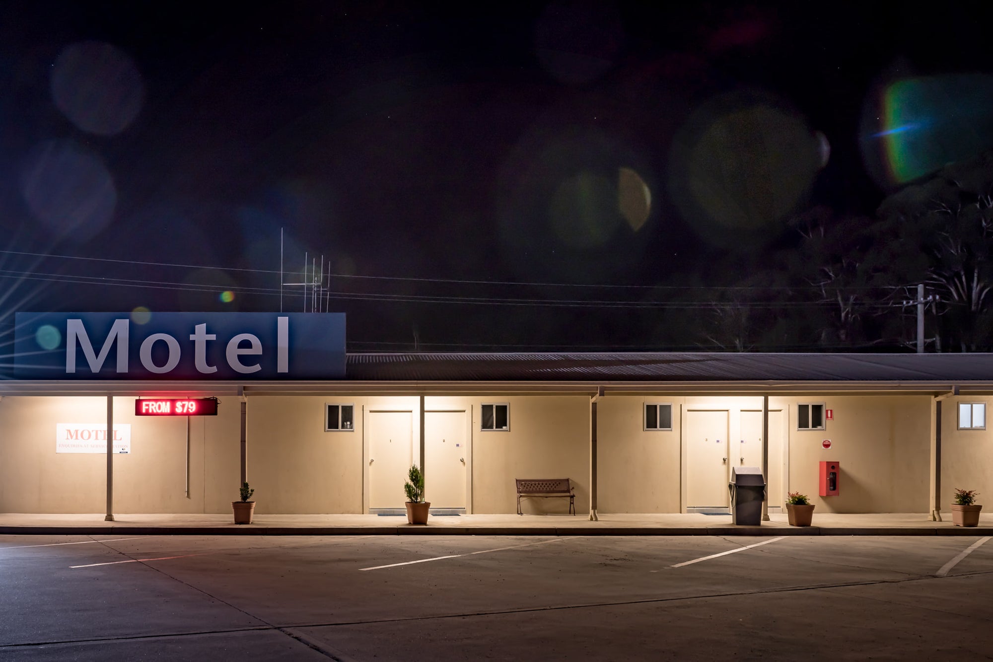 Yetholme Motor Inn at Hotel Motel 101, a single-storey motel stretches low across the frame under a black sky.