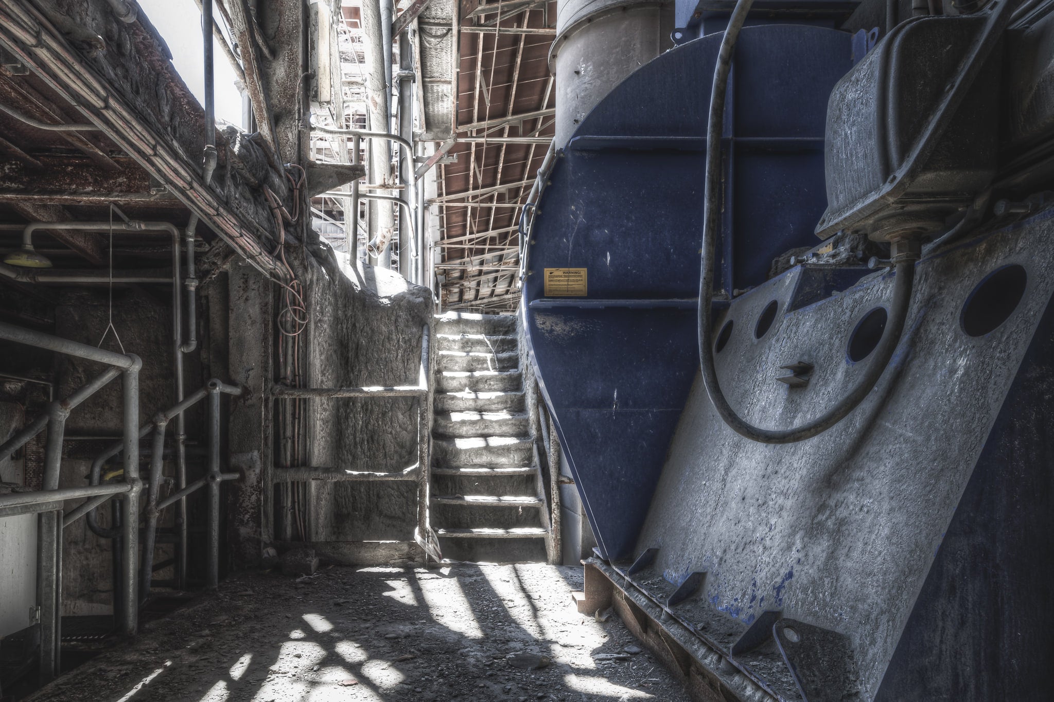 Kiln Discharge Cooler at Kandos Cement Works, a large blue cylindrical cooler dominates the right side of the frame.