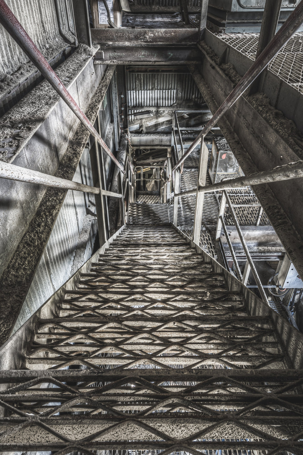 Stairs at Kandos Cement Works, looking down the stairwell of the cement mill - one of many that once crisscrossed the plant.
