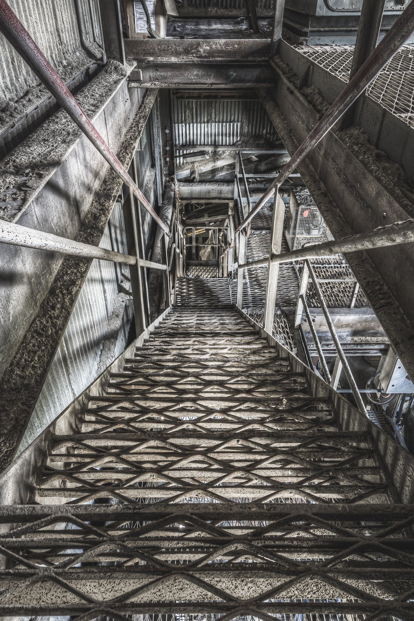 Stairs at Kandos Cement Works, looking down the stairwell of the cement mill - one of many that once crisscrossed the plant.