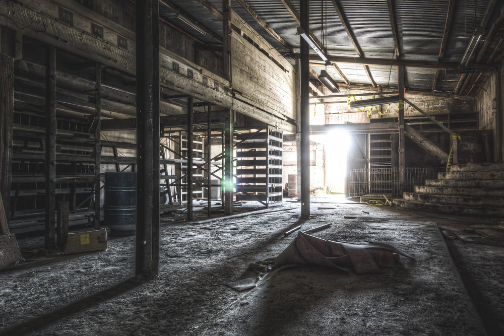 Store at Kandos Cement Works, racks stacked high with spare parts, tools, and equipment, ensuring the machinery never.