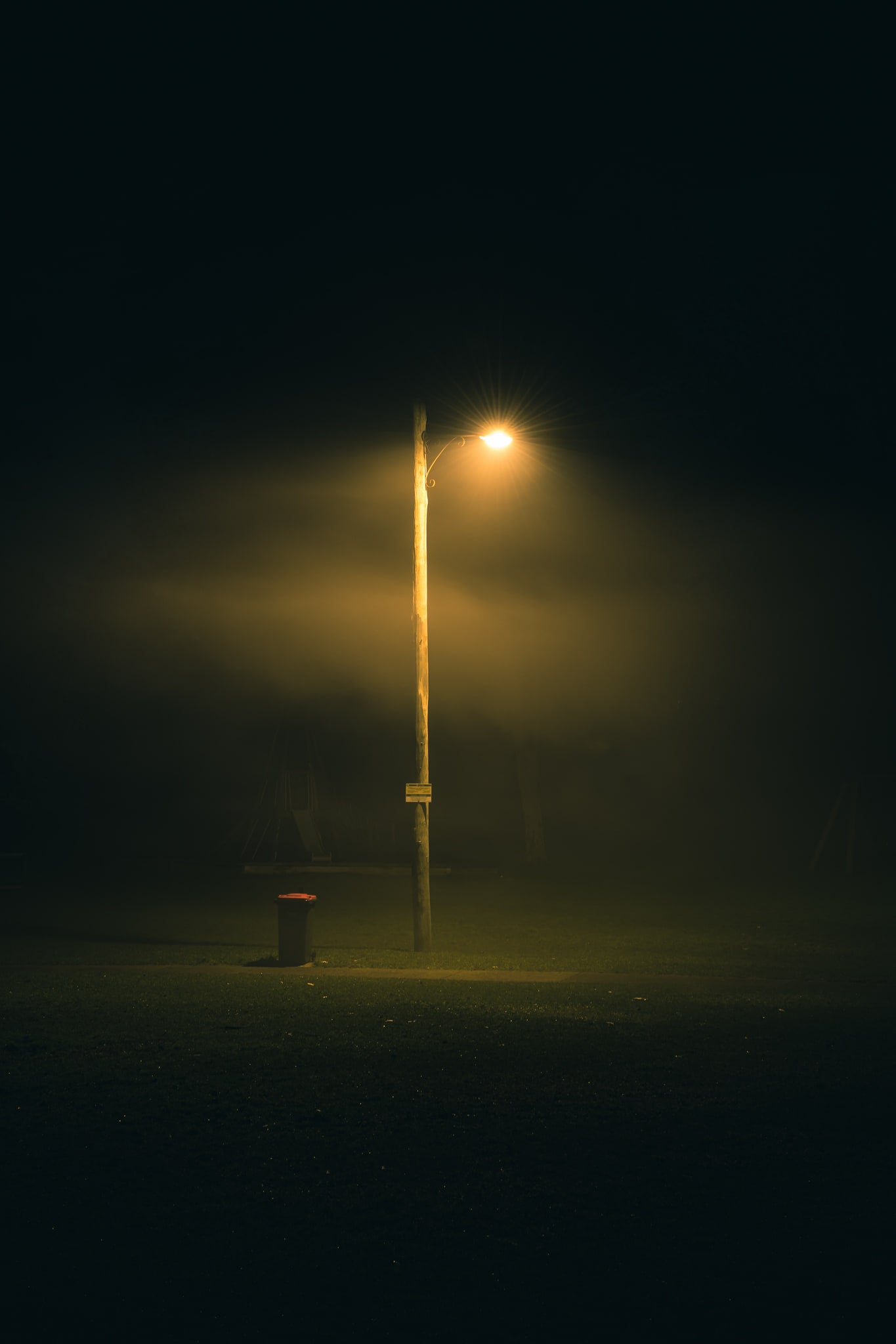 Dead Silence at Landscapes, a single sodium vapour streetlight burns on a timber power pole.
