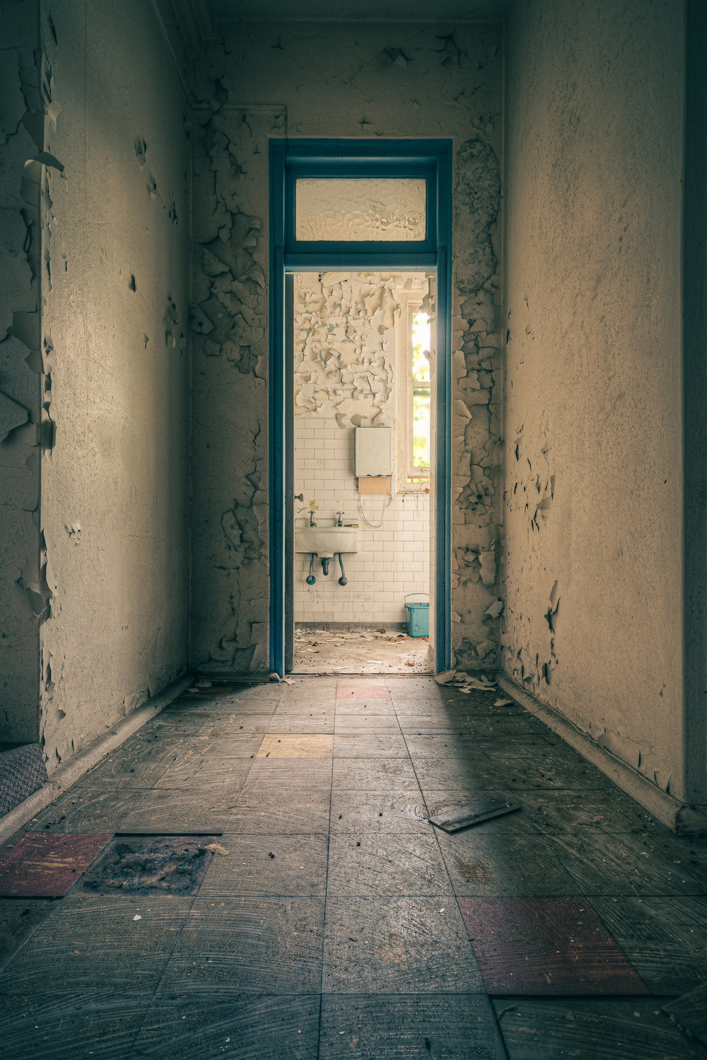 Bathroom Corridor at Lewisham Hospital, a narrow corridor leads to a small bathroom.