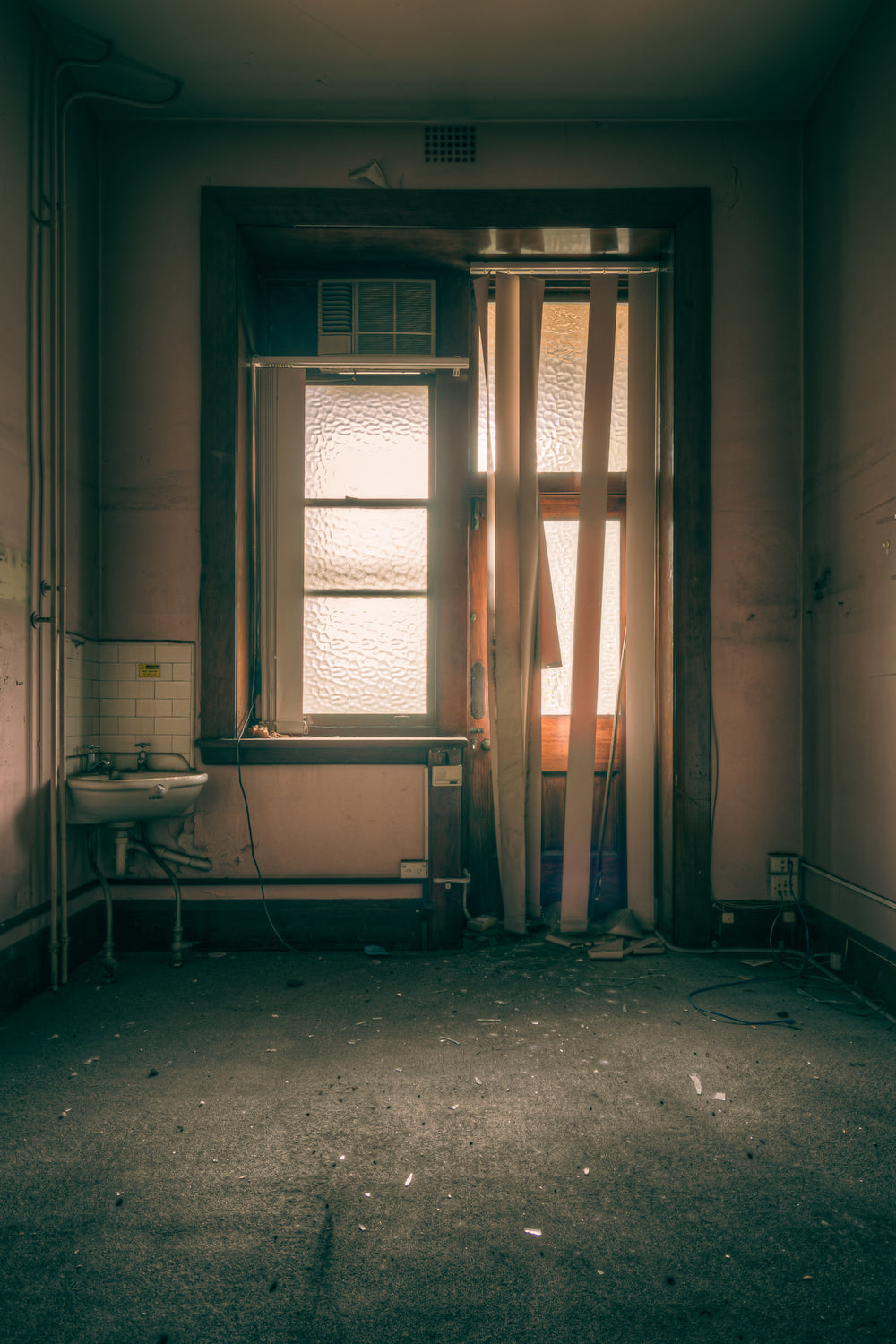 Blind at Lewisham Hospital, a small room, stripped back to its bones.