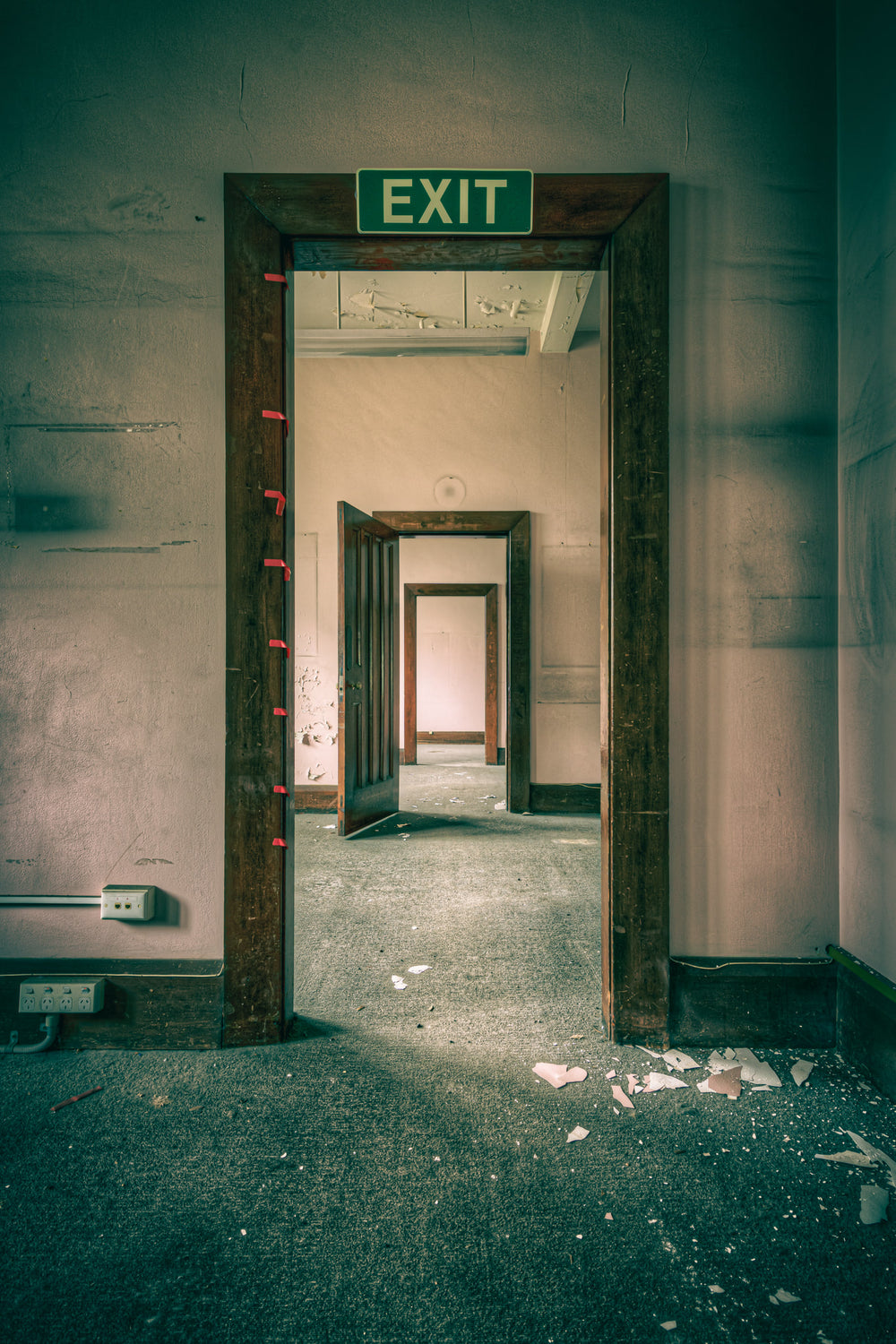 Doors in Doors at Lewisham Hospital, three doorframes recede in sequence through stripped-out rooms.