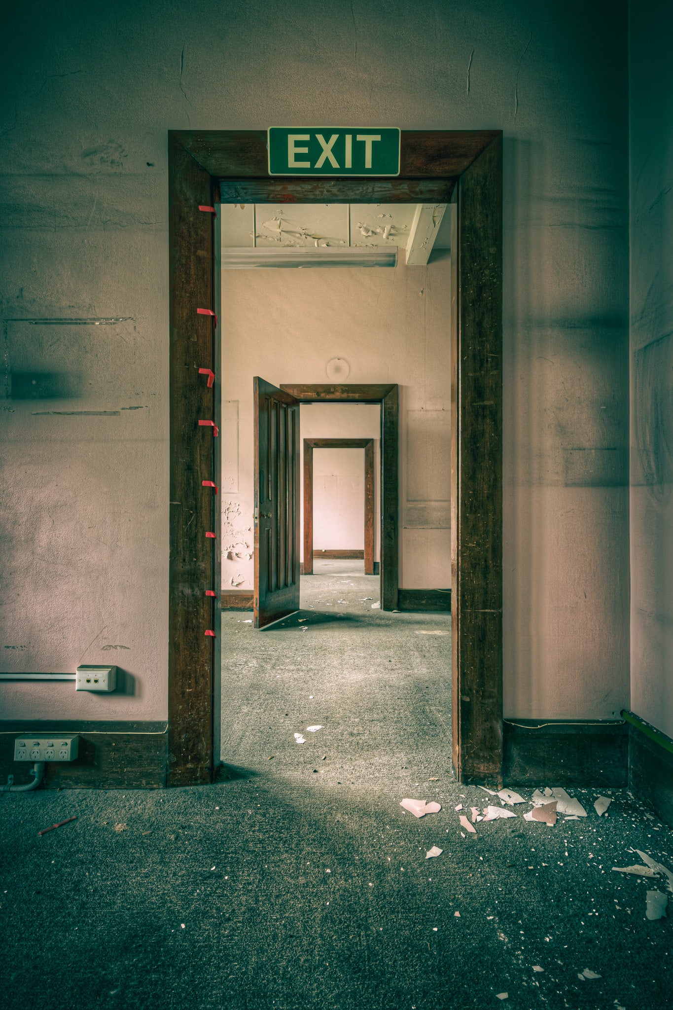 Doors in Doors at Lewisham Hospital, three doorframes recede in sequence through stripped-out rooms.