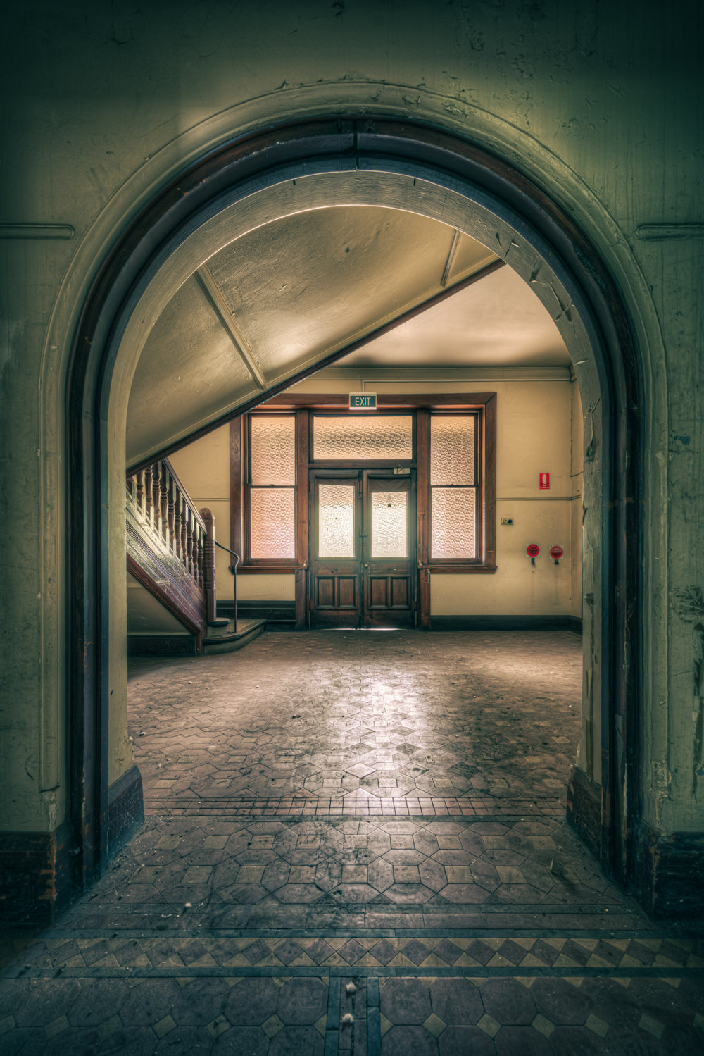 Foyer Archway at Lewisham Hospital, a wide stone archway frames the entrance foyer.
