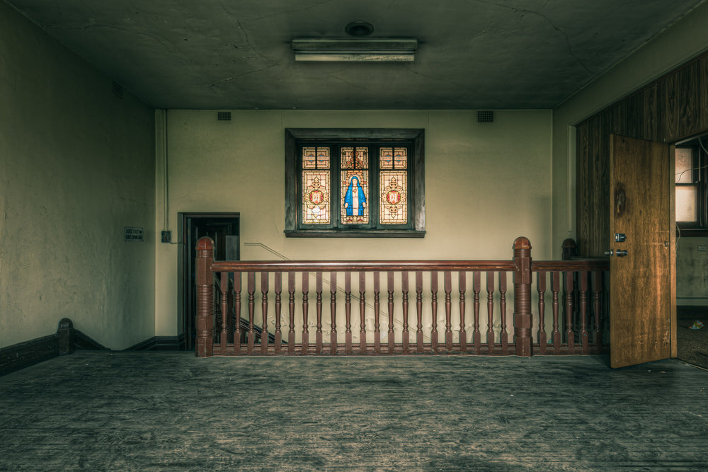 Mary at Lewisham Hospital, an upper-floor landing inside Lewisham Hospital.