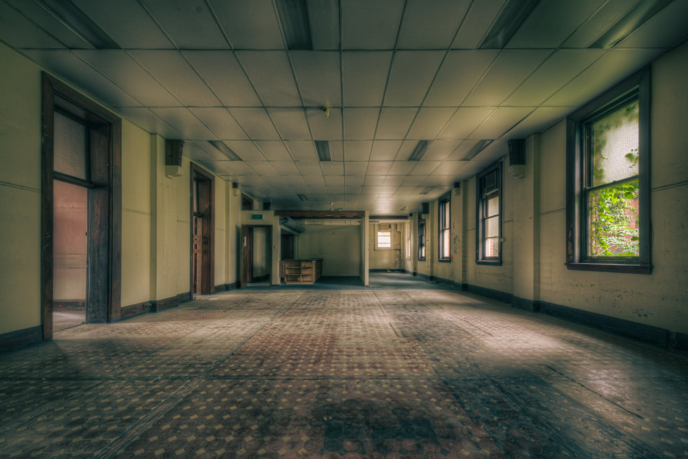 Tesselated at Lewisham Hospital, a wide corridor or ward hall stretches deep into the building.
